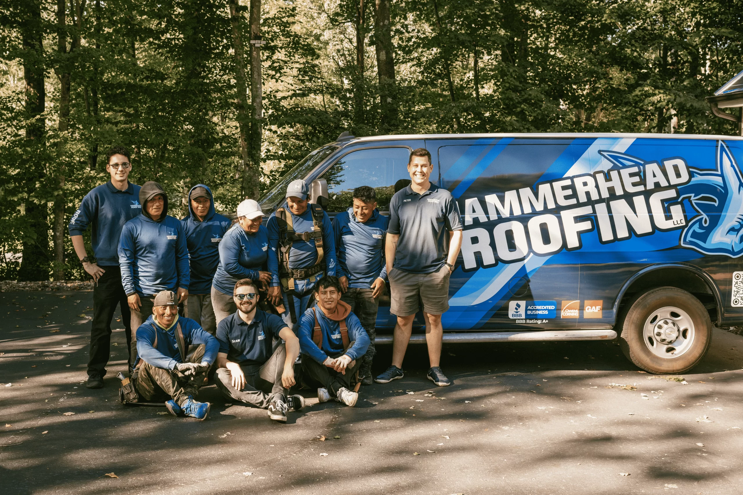HammerHead Roofing team in front of company truck